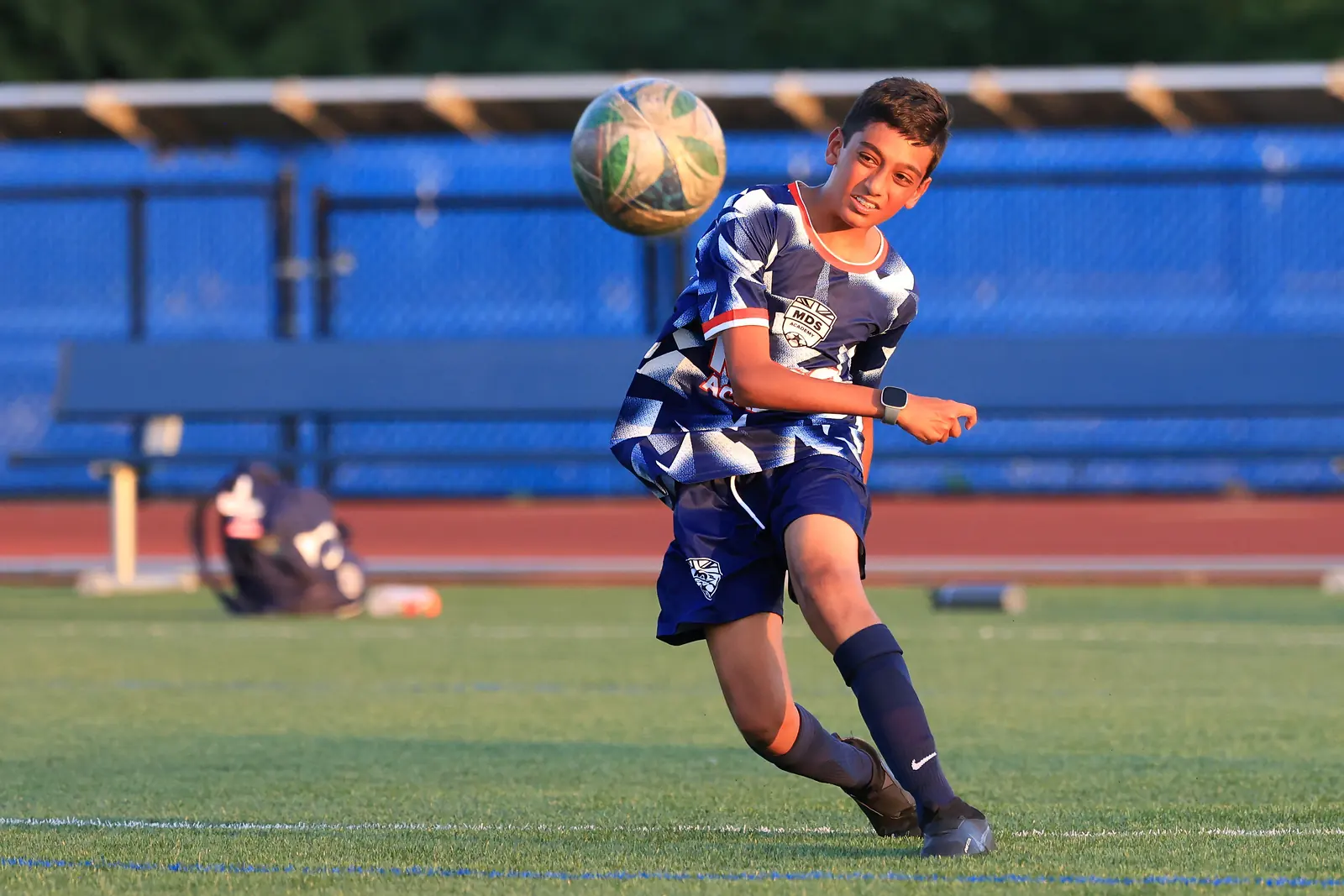 MDS Academy player heading the ball, for the MDS College 360 virtual recruiting program