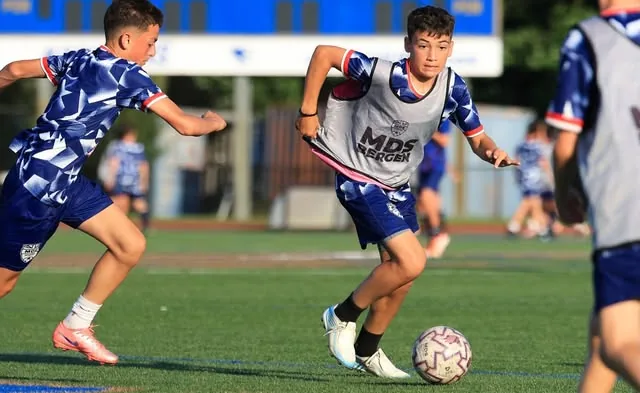 Players dribbling during an MDS training session