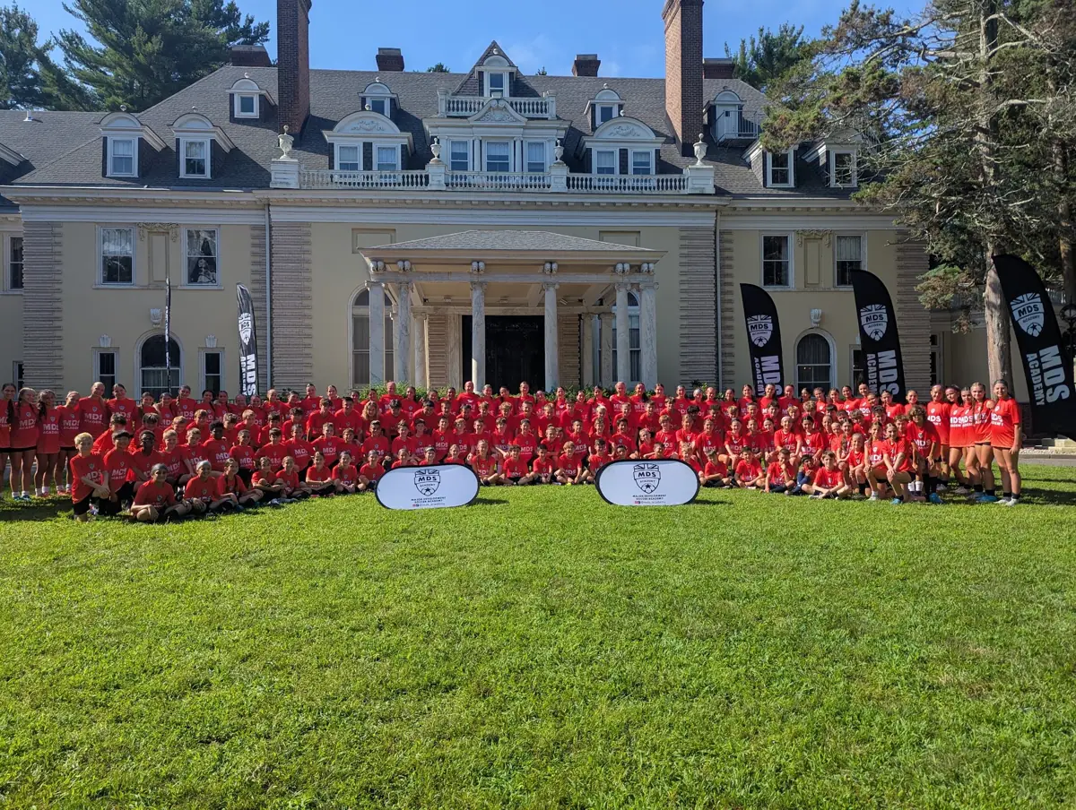 The whole MDS Residential Camp group in front of Georgian Court University